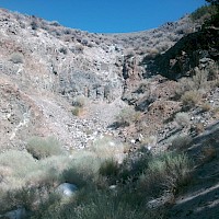 Open cut mined along shear in the back